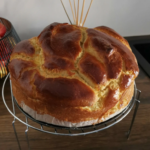 Sliced braided chocolate chip brioche recipe showing the chocolate-filled interior