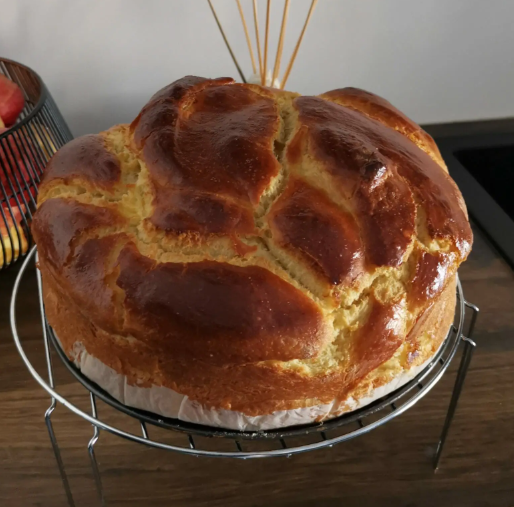 Sliced braided chocolate chip brioche recipe showing the chocolate-filled interior